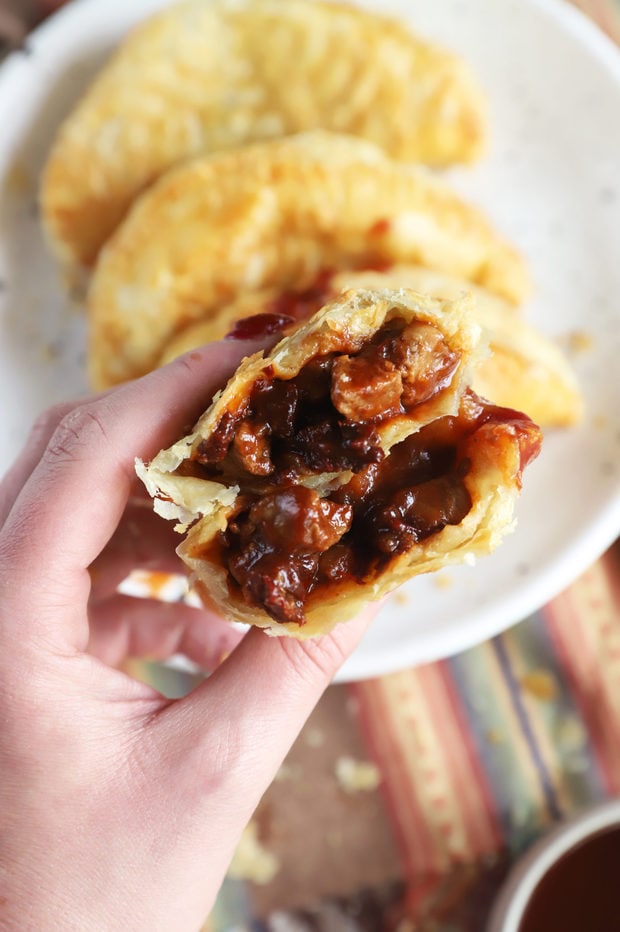 Hand holding empanadas photo