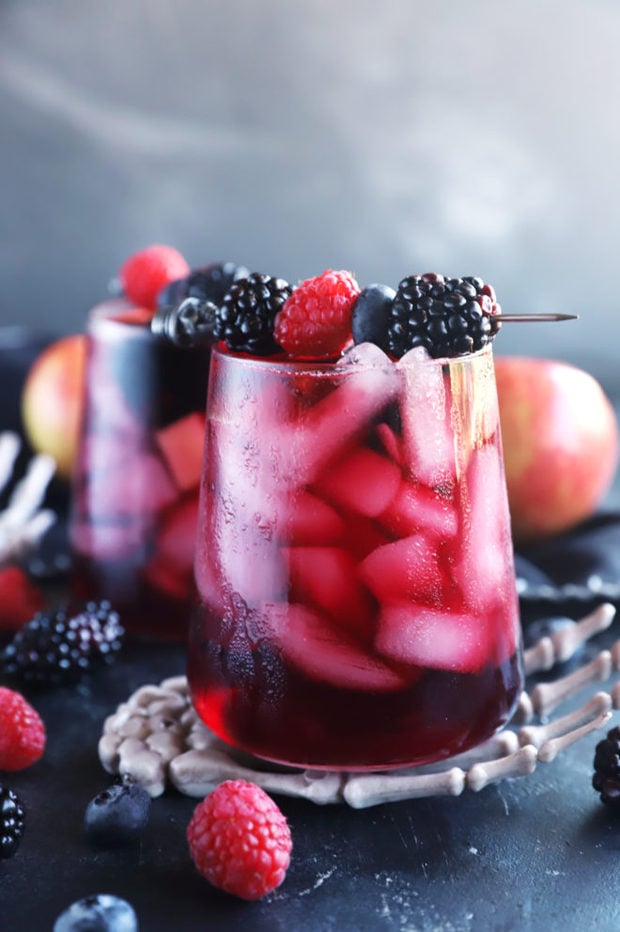 Side image of glasses of sangria with berries