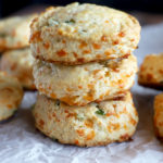 Side photo of a stack of jalapeno cheddar biscuits