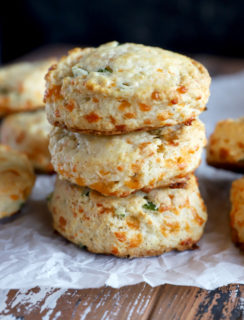 Side photo of a stack of jalapeno cheddar biscuits