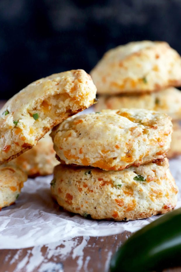 Biscuits in a pile with jalapeño and cheddar image