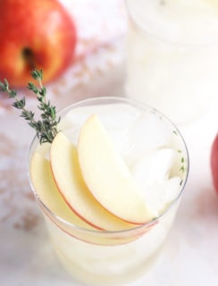 Photo of a gin and tonic with apple