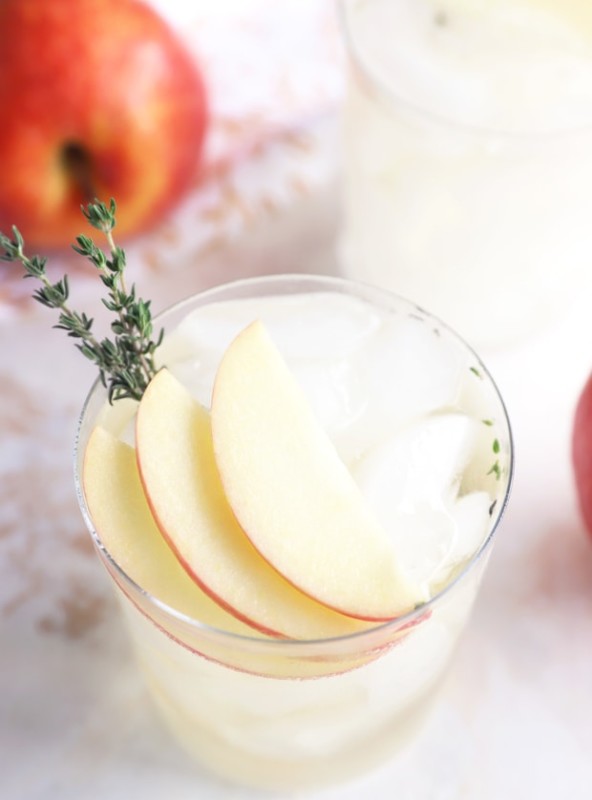 Photo of a gin and tonic with apple