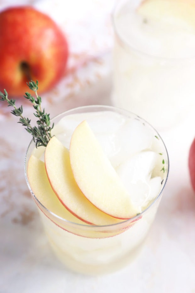 Photo of a gin and tonic with apple