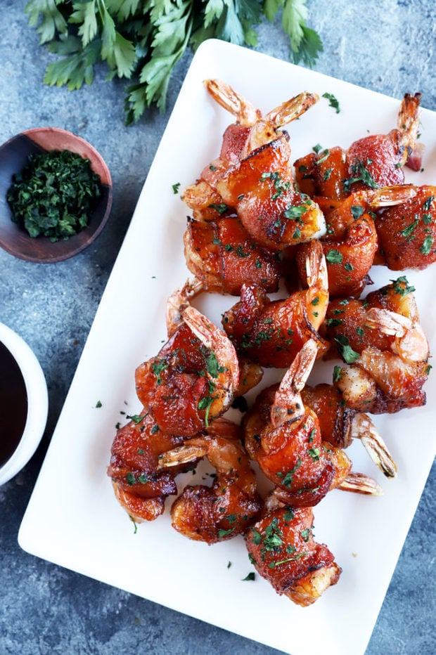 Overhead image of BBQ shrimp on platter