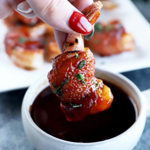 Dipping a shrimp in BBQ sauce image
