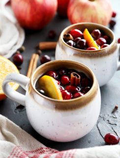 Side photo of apple cider in mugs