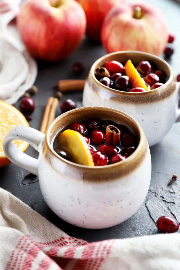 Side photo of apple cider in mugs