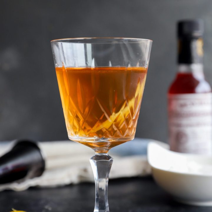 Side photo of bourbon cocktail in crystal glass