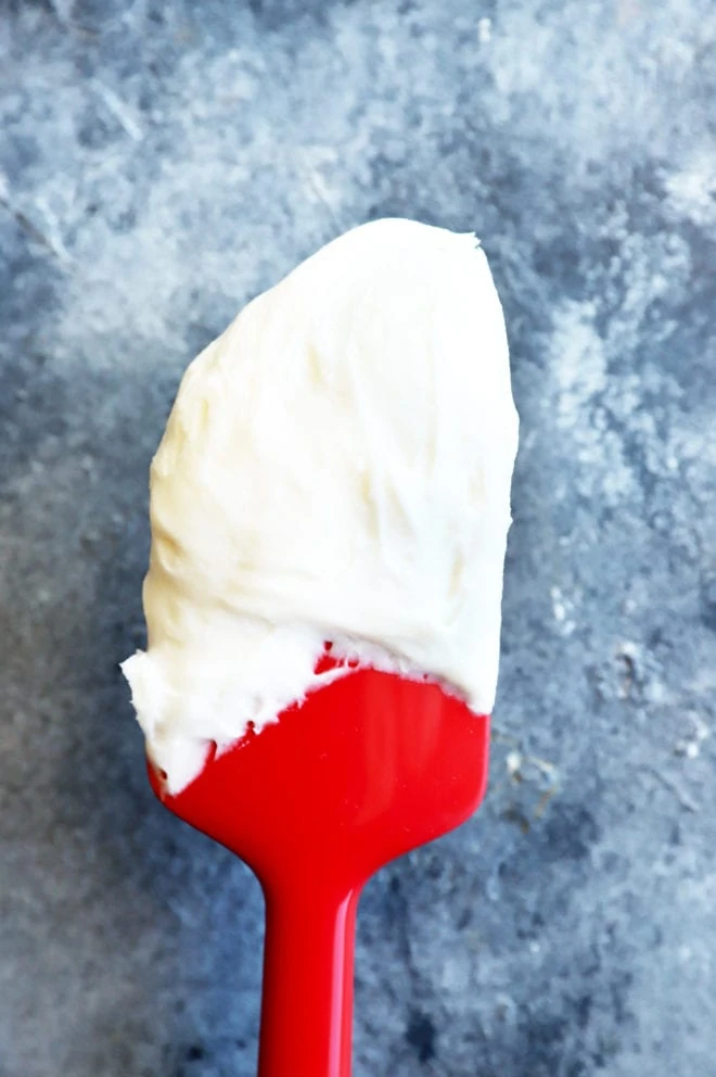Spatula with champagne cream cheese frosting picture