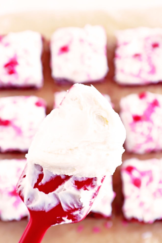 champagne cream cheese frosting on spatula image