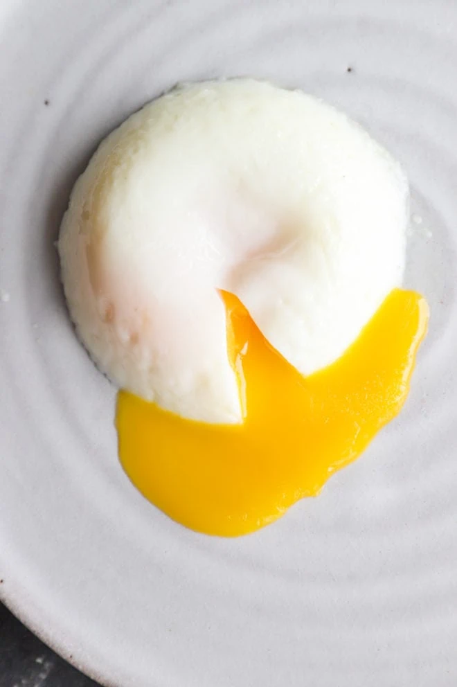 Poached egg on a plate image