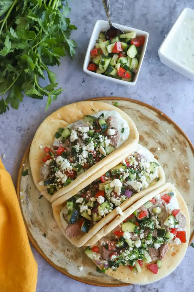 Gyro tacos image overhead on platte