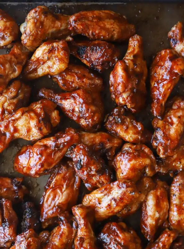 Overhead image of chicken wings on baking sheet