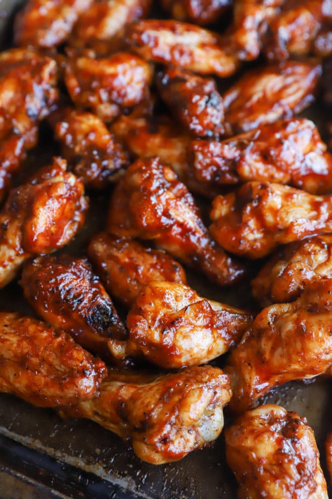 Grilled chicken wings on platter image