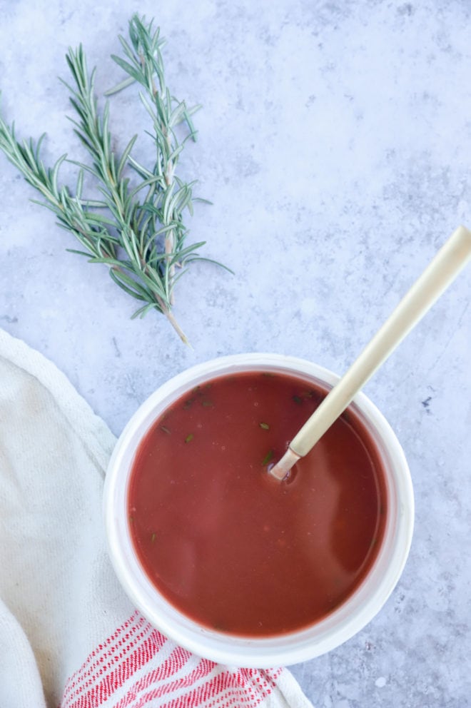 Red wine sauce in a bowl with rosemary picture