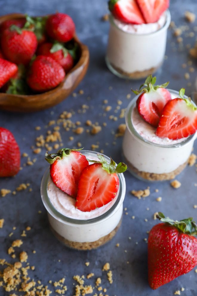 Strawberry cheesecake mousse in jars with fresh berries