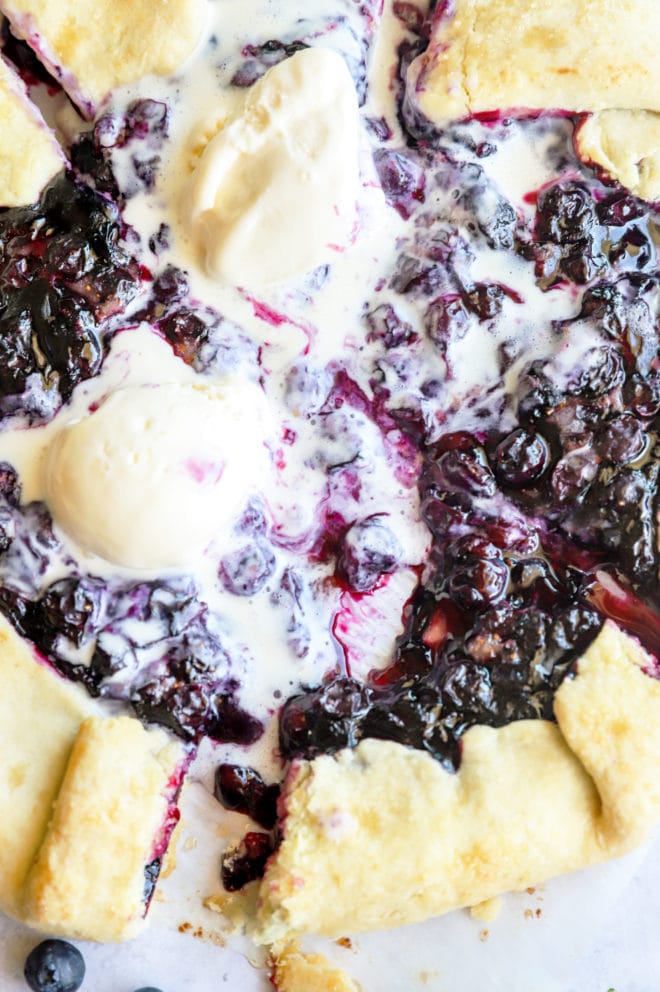 Eating blueberry galette image with ice cream