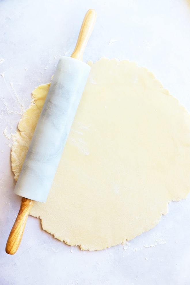 Rolling pin with pastry dough picture