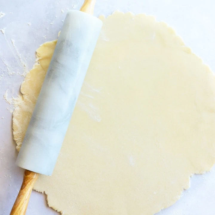 Galette dough rolled out with rolling pin image