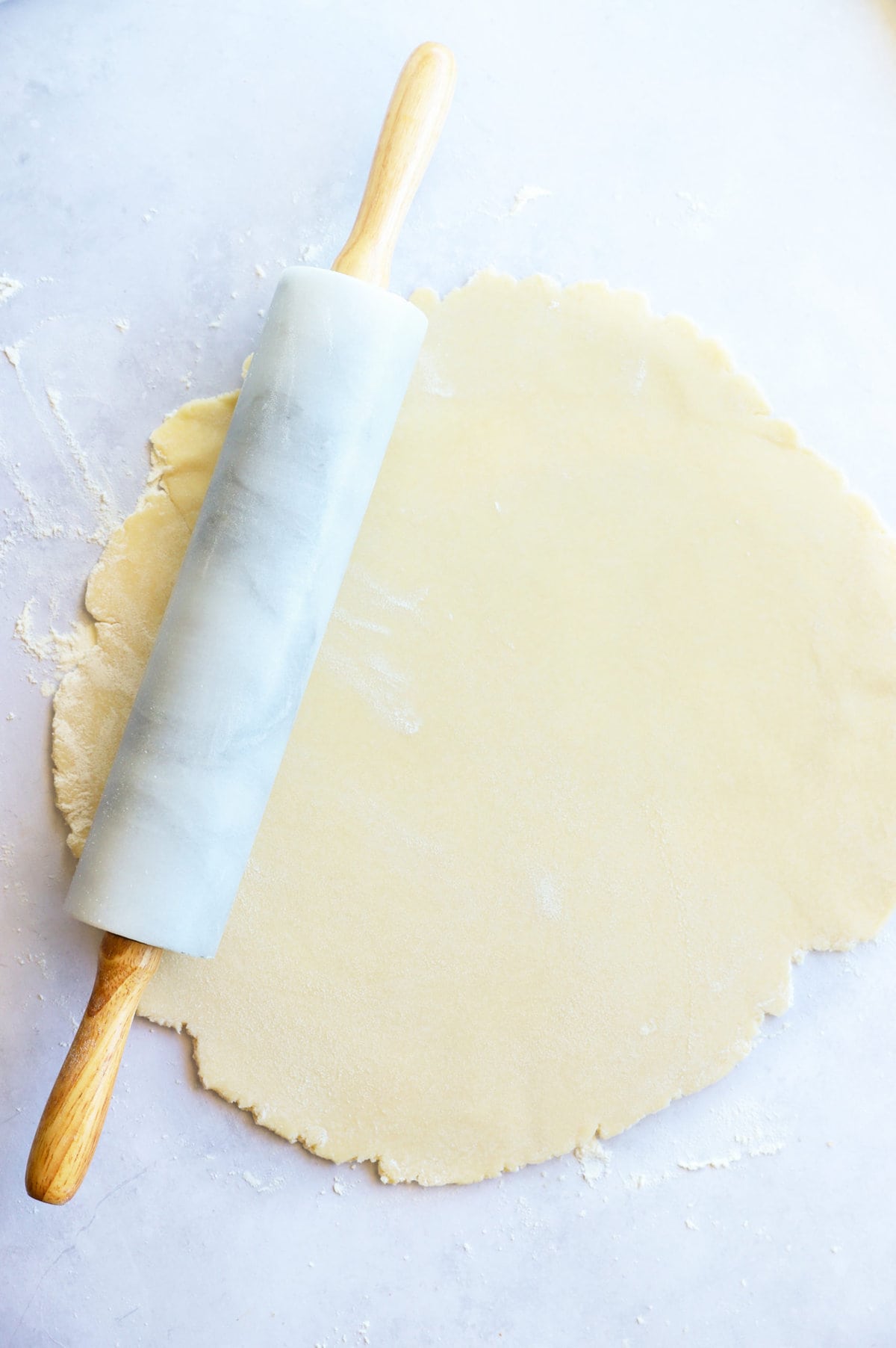 Galette dough rolled out with rolling pin image