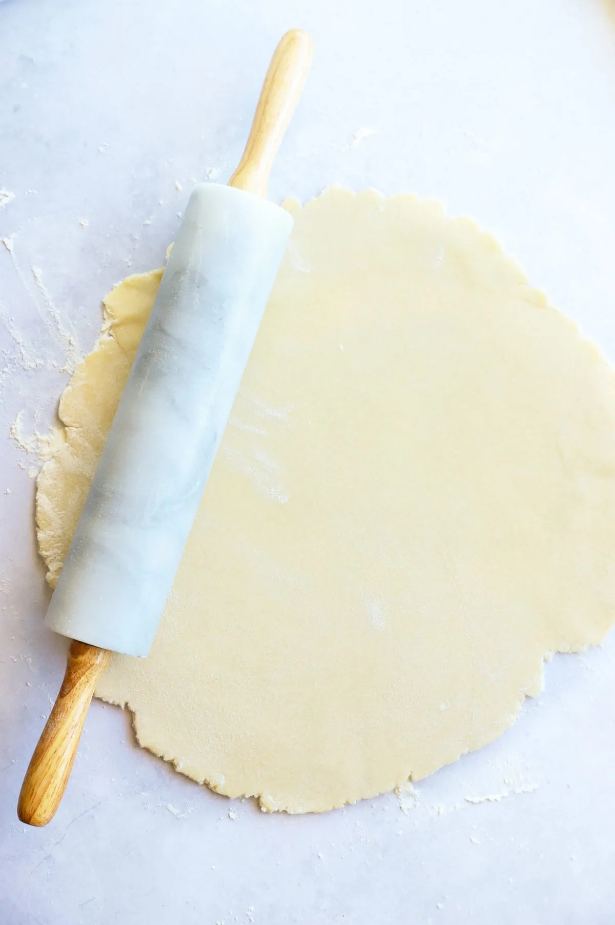 Galette dough rolled out with rolling pin image