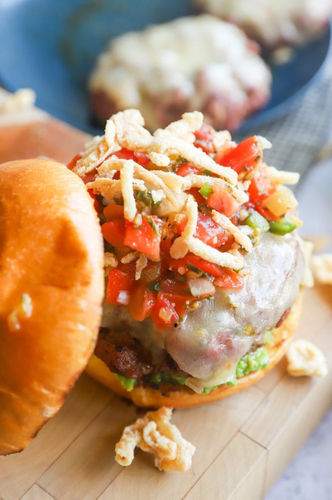 Photo of a burger with salsa and onions