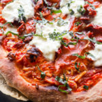 Grilled burrata pizza image on parchment