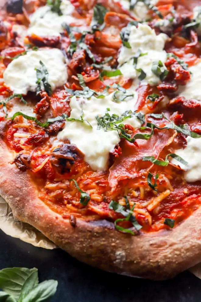 Grilled burrata pizza image on parchment