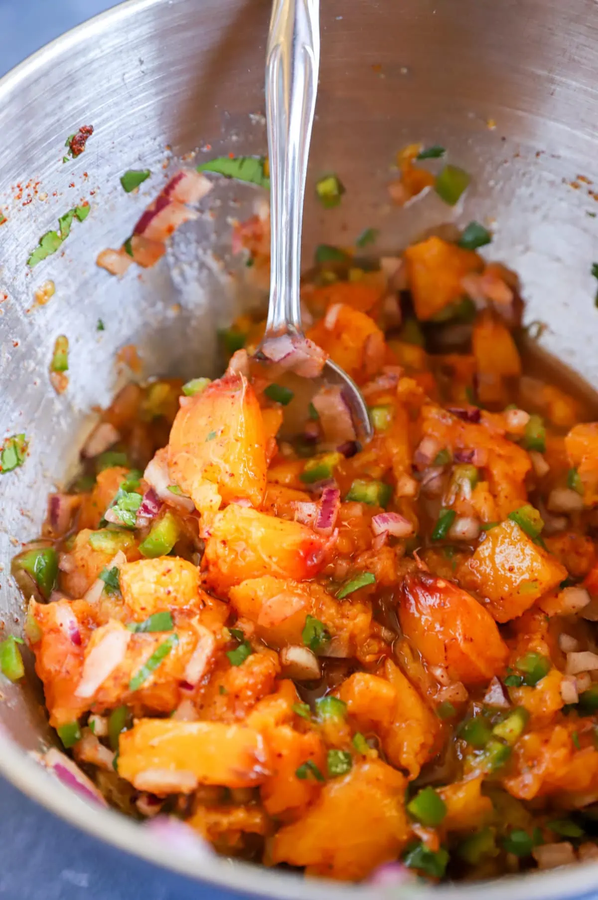picture of spicy peach bacon salsa in bowl