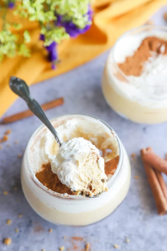 Image of a spoon with cheesecake mousse