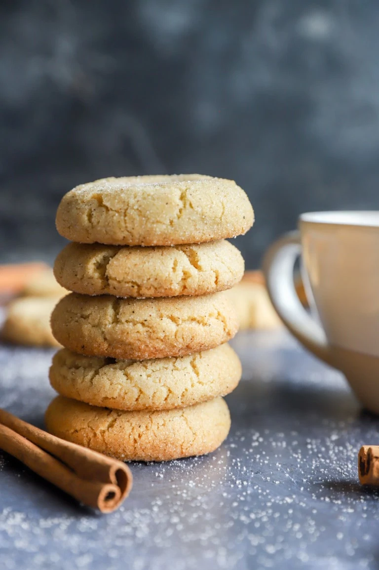 Stack of chai cookies with coffee