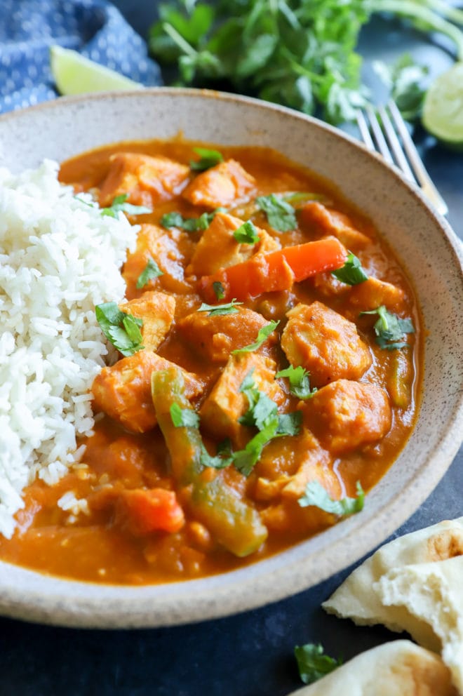 Instant pot curry chicken in a bowl with rice picture