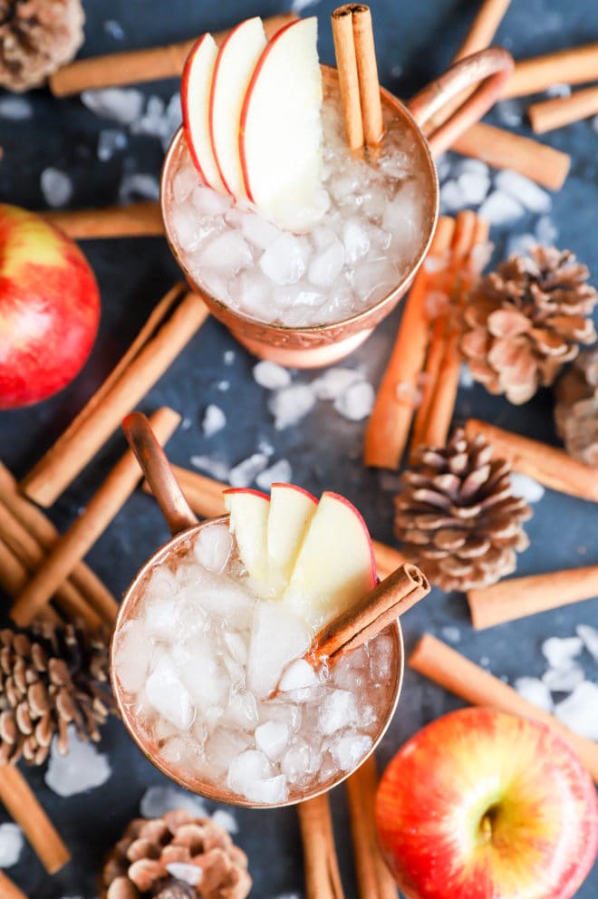 Overhead image of apple cocktails in mugs