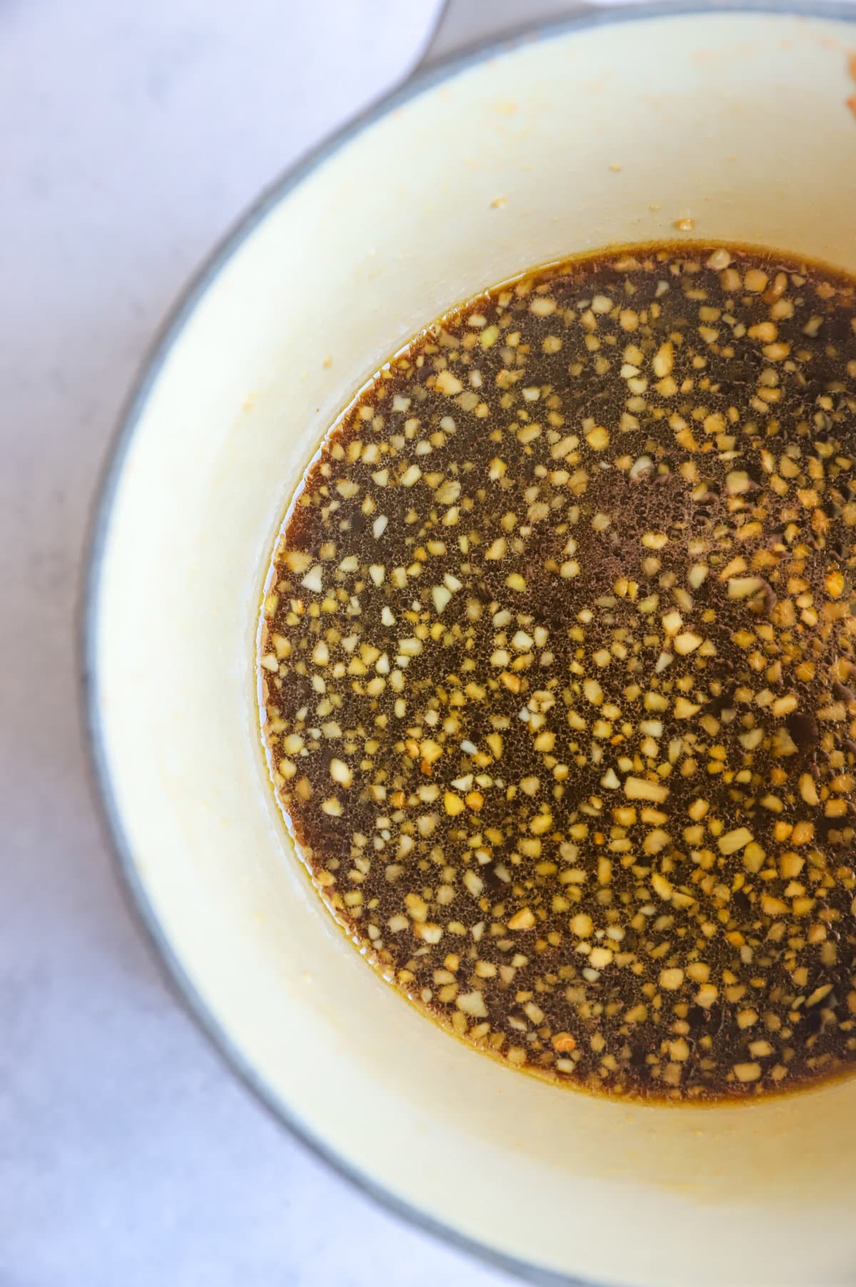 hot honey whiskey sauce in a saucepan image