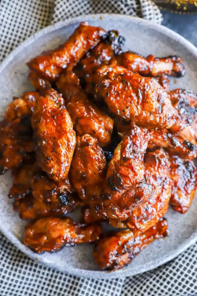 Overhead image of chicken wings on a plate