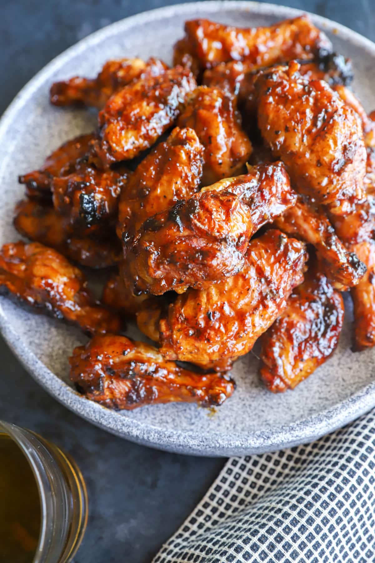 hot honey whiskey wings on a plate image