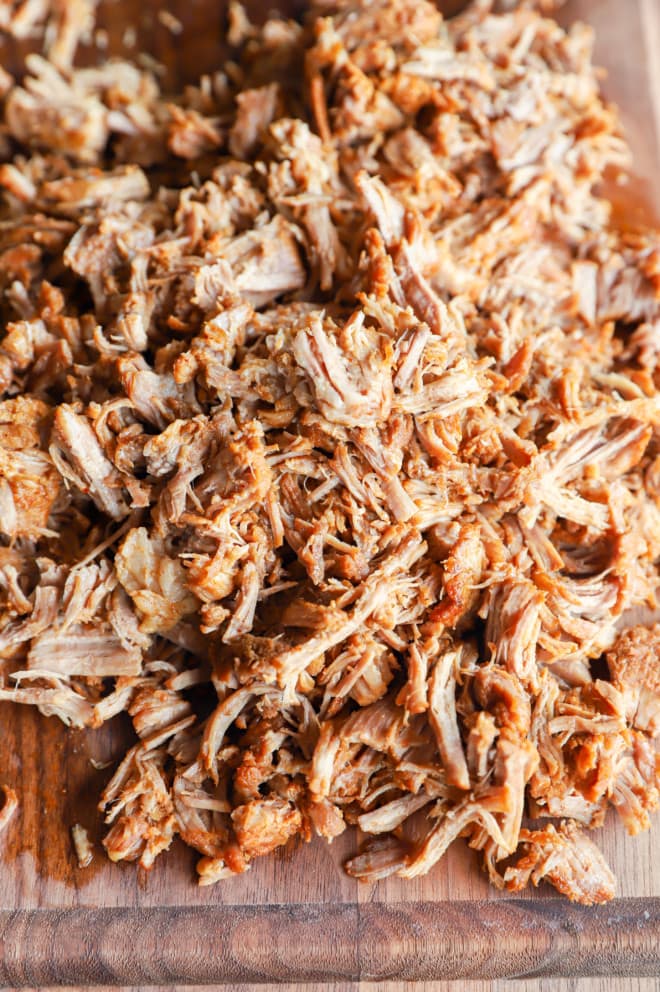 Shredded pork on cutting board image