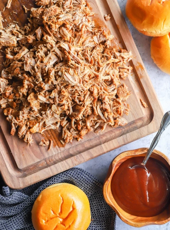 pork on cutting board with bbq sauce image