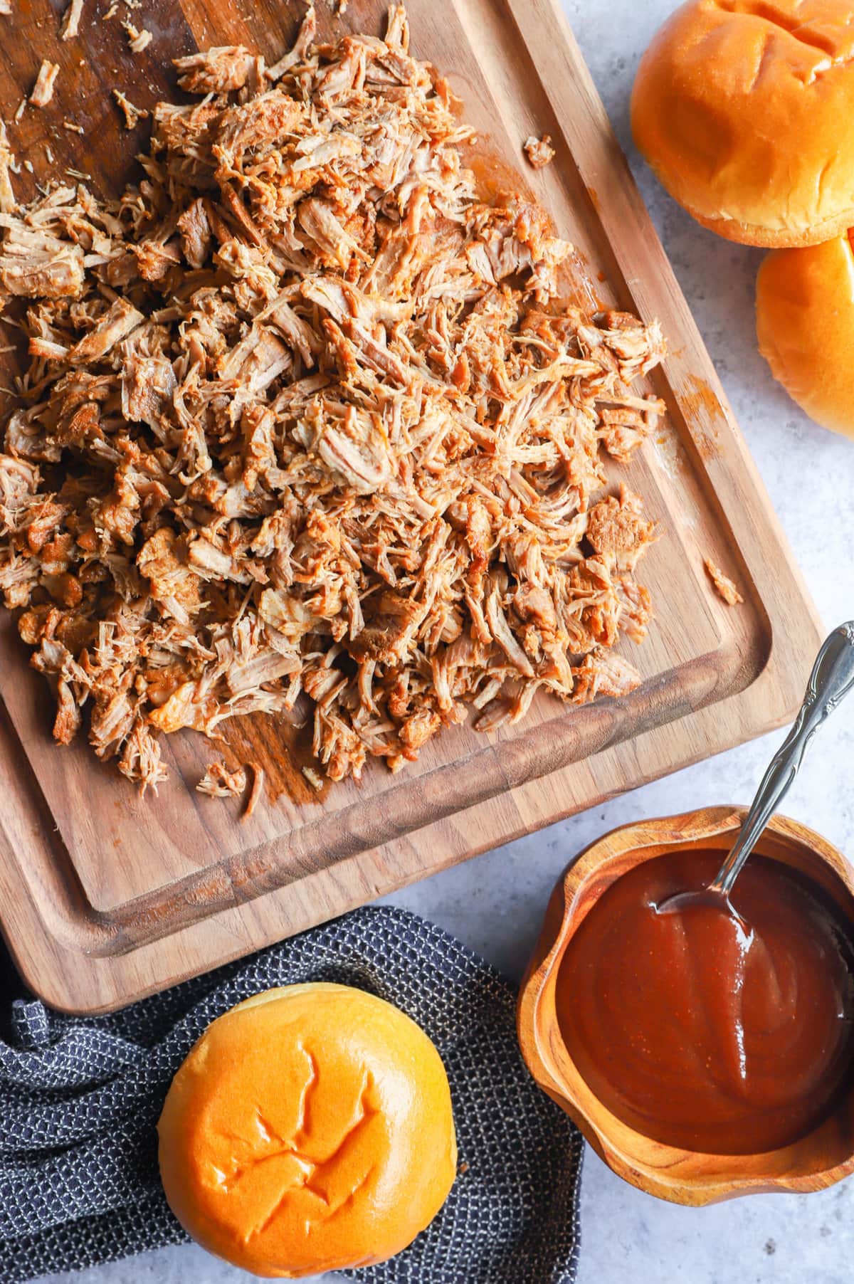 pork on cutting board with bbq sauce image