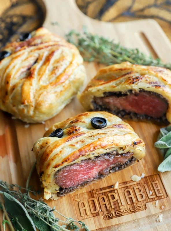 Image of beef wellington cut into on cutting board