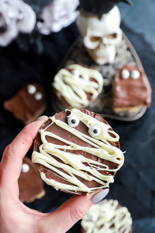 Hand holding mummy cereals treats