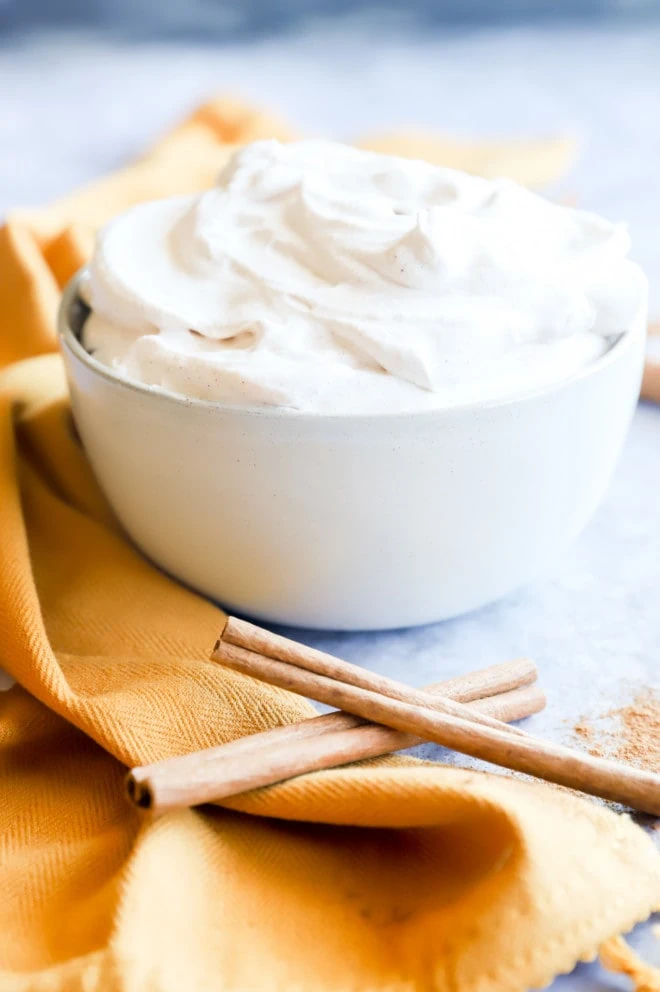 Side image of cinnamon whipped cream in bowl