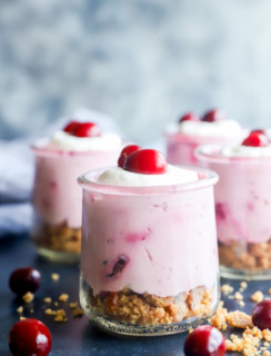 Photo of cups of holiday mousse with crumble on bottom layer