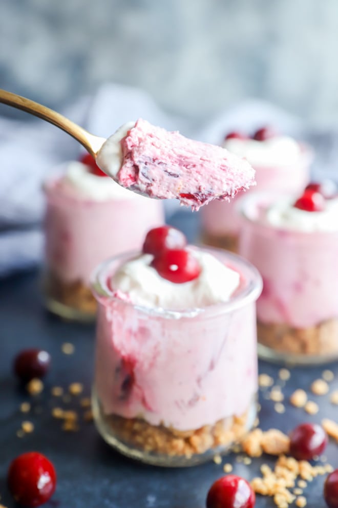 Spoonful of cranberry cheesecake mousse from jar