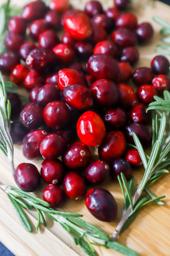 Fresh cranberries and rosemary sprigs picture
