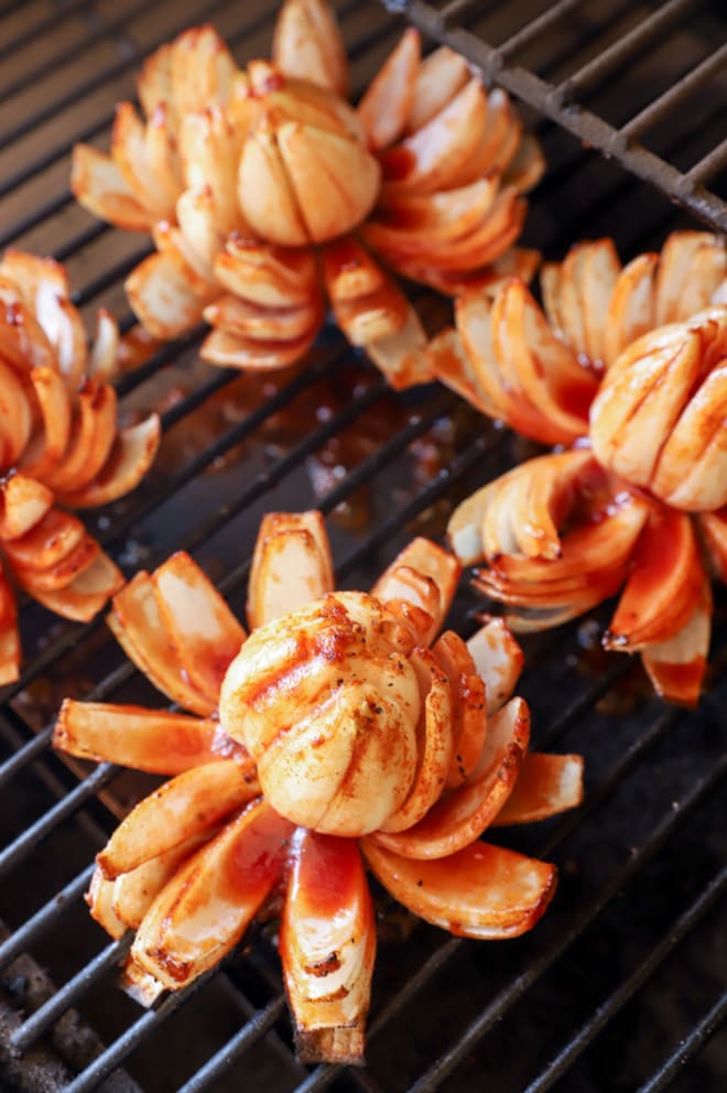 Picture of grilled blooming onion on grill