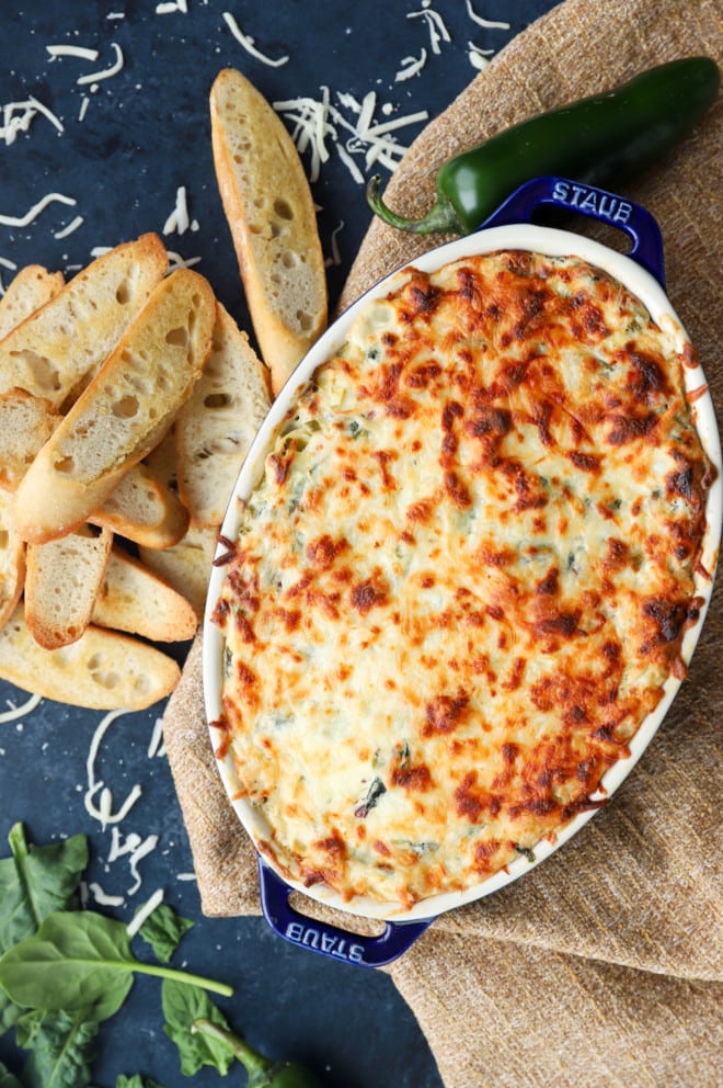 Overhead image of spinach artichoke dip in dish