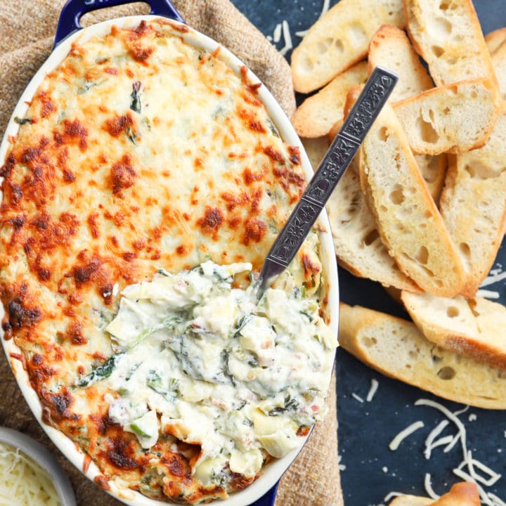 Overhead image of bacon jalapeno spinach artichoke baking dish