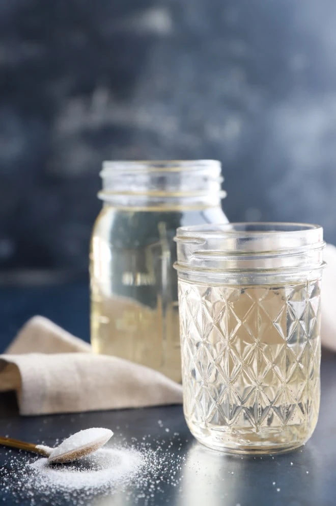 Simple syrup in jars with sugar picture